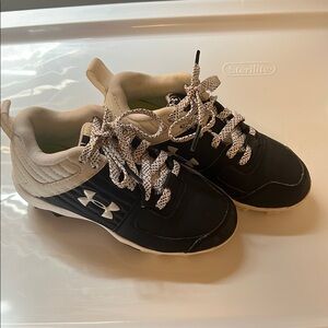 Under Armour Black and White Cleats Sporty Design